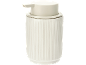 Beige soap dispenser with vertical ridges.