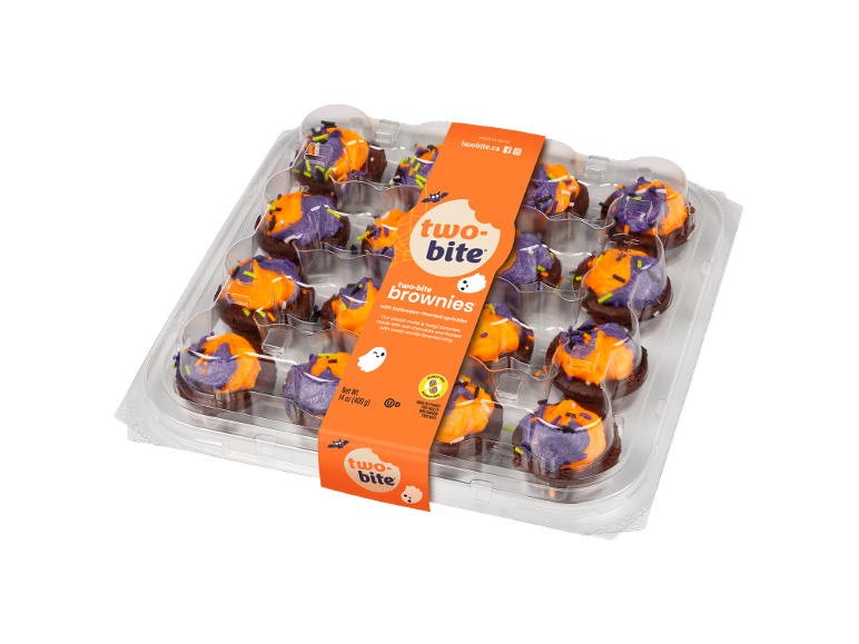 Halloween-themed two-bite brownies with orange and purple icing and sprinkles in a clear plastic container.