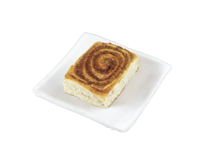 Cinnamon roll on a white napkin.