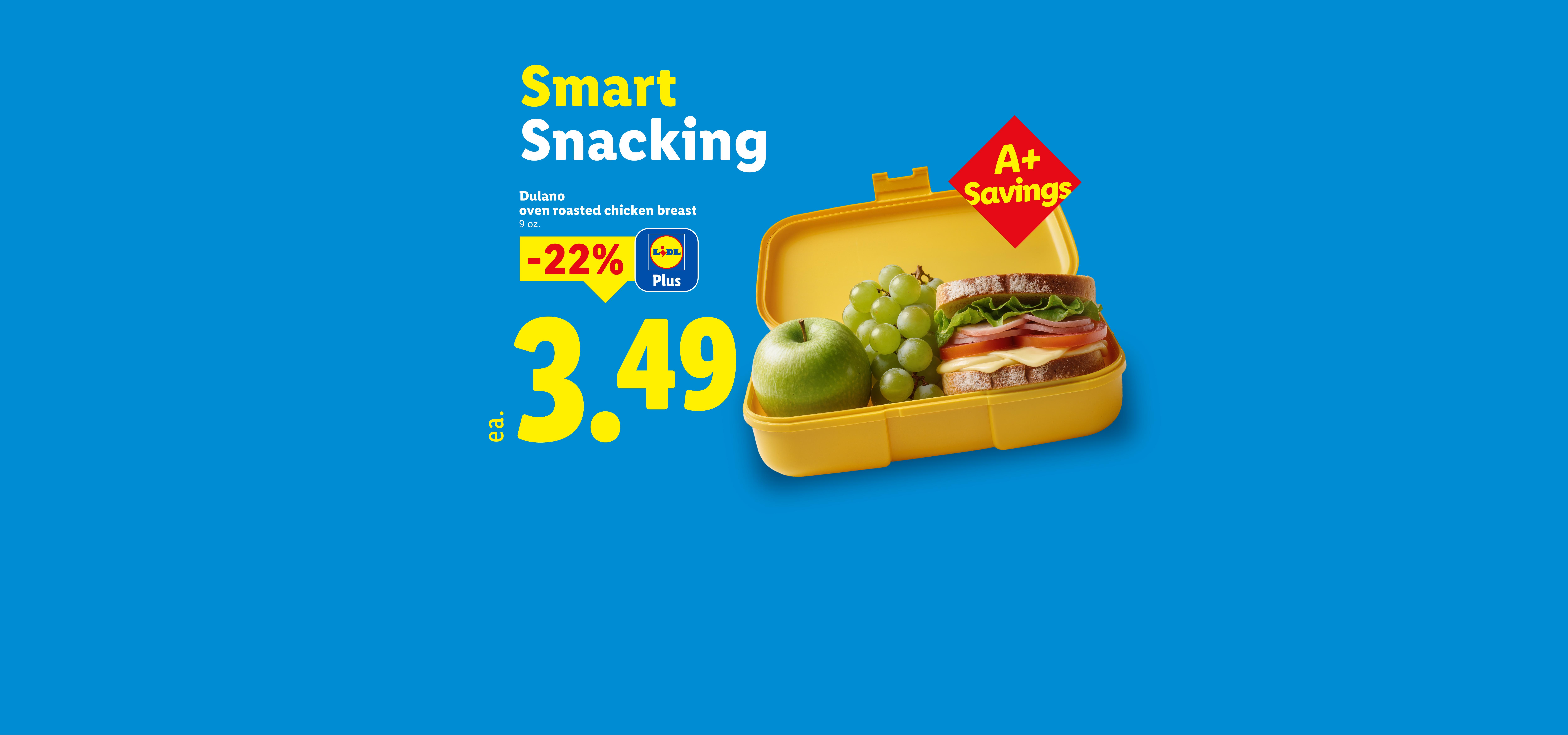 A yellow lunchbox with a sandwich, green apple, and grapes, advertising 'Smart Snacking' with a 22% discount on oven-roasted chicken breast for $3.49.