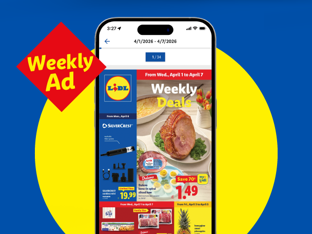 Phone displaying a weekly ad with deals on ham, electronics, and groceries, against a blue and yellow background.