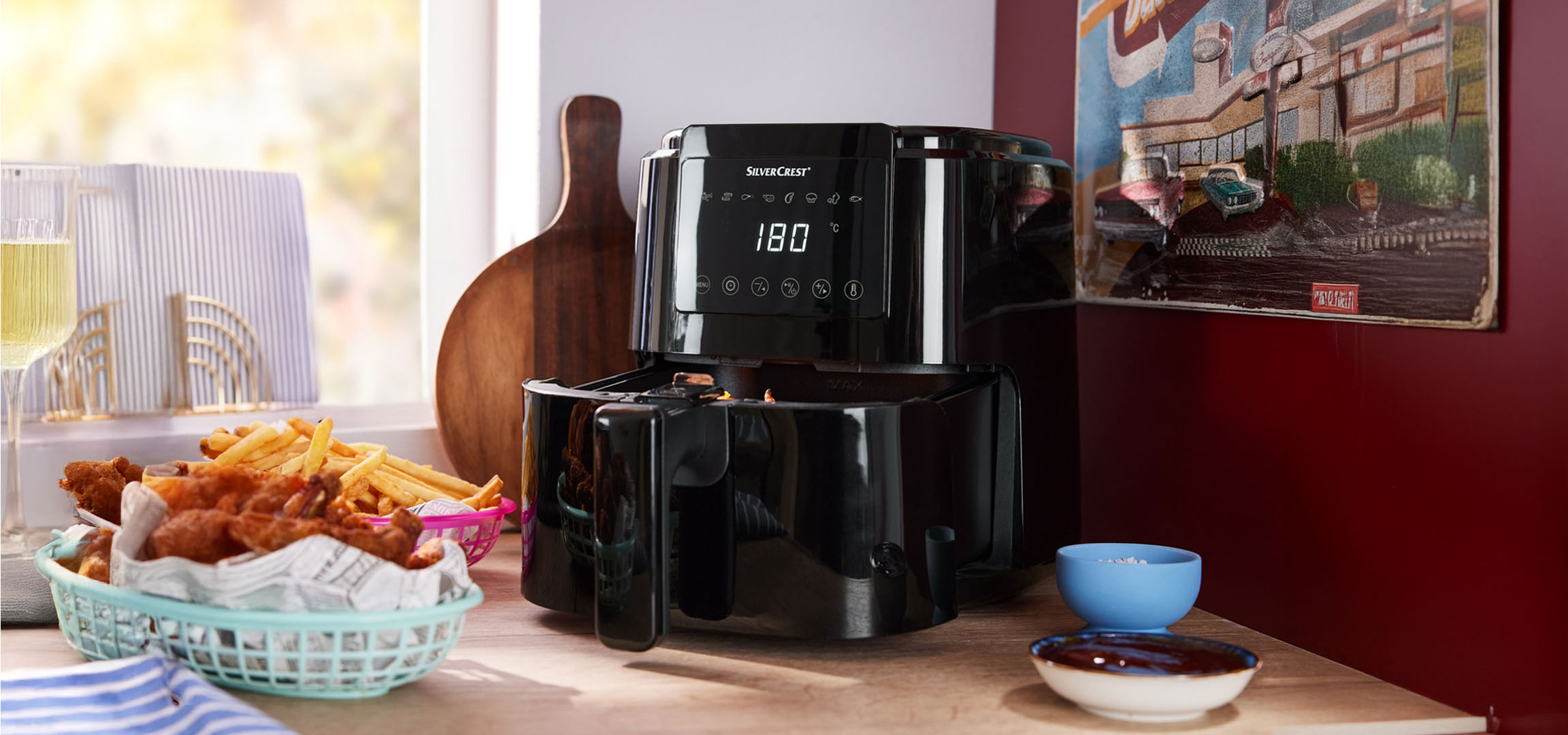 Air fryer SilverCrest, batatas fritas e frango.